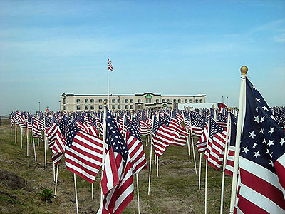 Patriot Day Healing Field at Crossroads Point with Wingate Inn in background