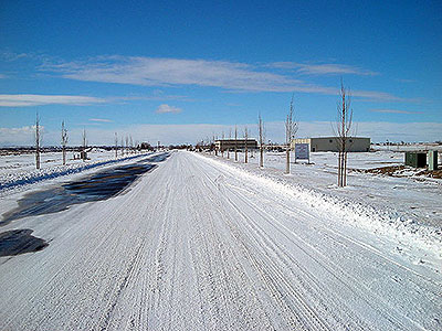 Plowed Winter Road at Crossroads Point Business Center